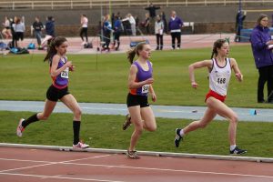 Kate Gallagher (340) and Sarah Calvert (334) make ready for the final lap in the senior 1500m as they gained maximum points 