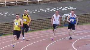 Peter Muirhead (4) on the way to 200 metre B victory