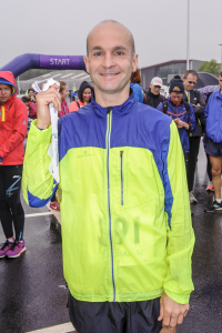 Scott Brember at medal presentation for Stirling 10K - photo by Bobby Gavin