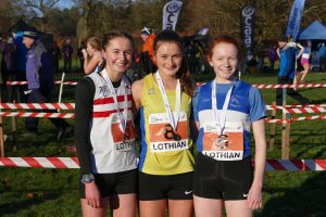 Kate Gallagher (8) and other medallists