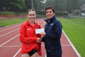 Mhairi MacLennan receives her prize from Cathy Gallagher