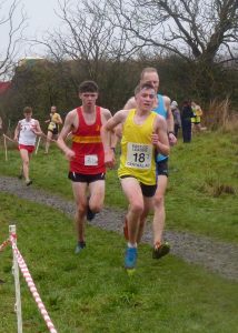Sandy Holl among the counters